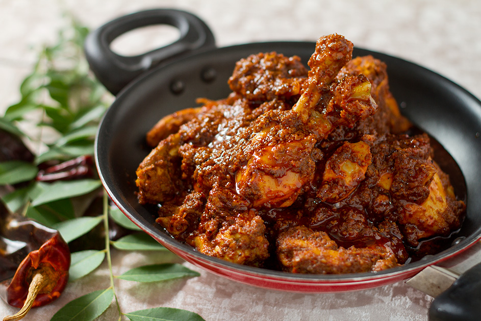 Chicken Ghee Roast, chicken in a glossy, spicy, ghee-laden roasted masala