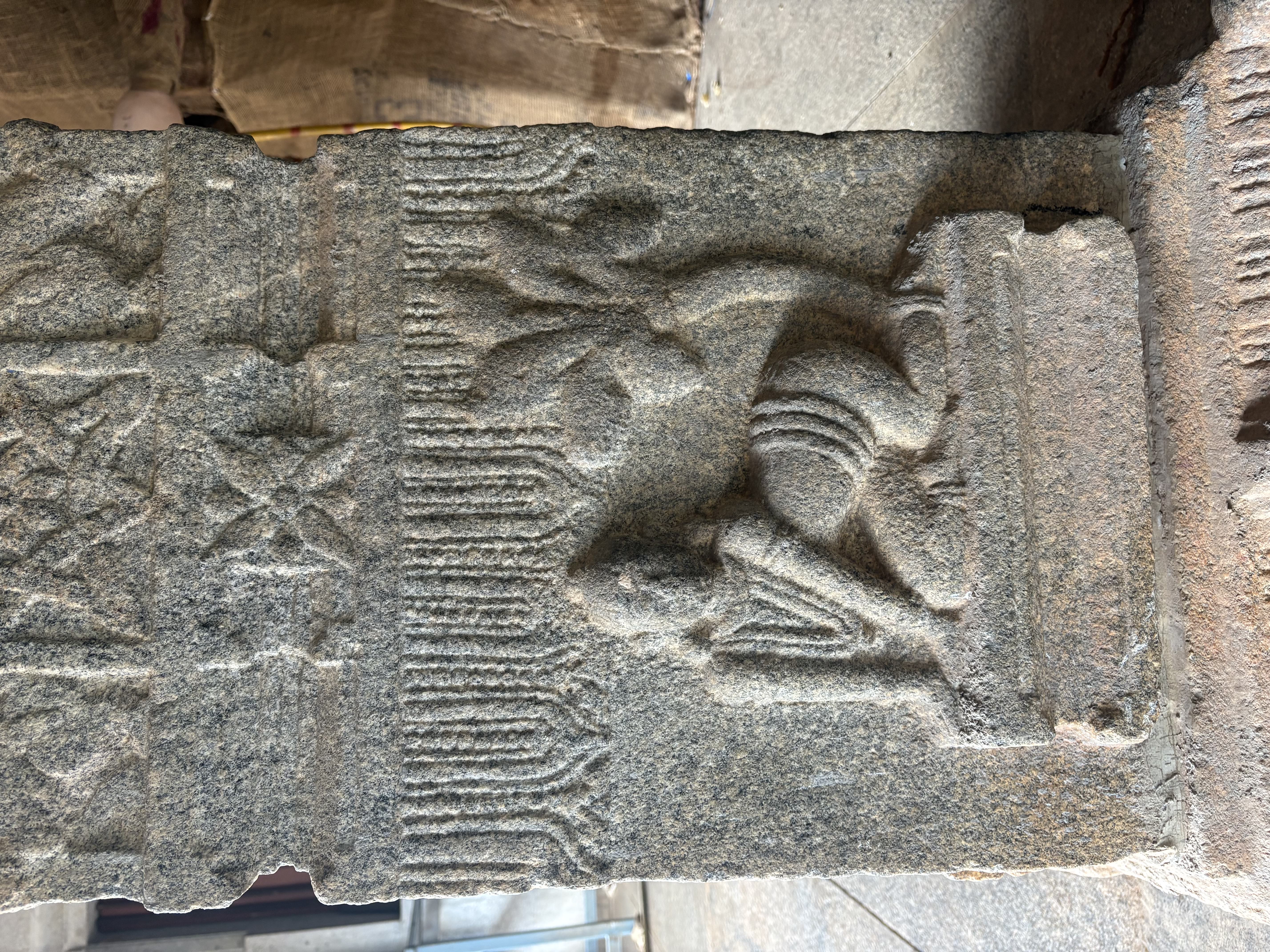 Seated ascetic carved on a temple pillar